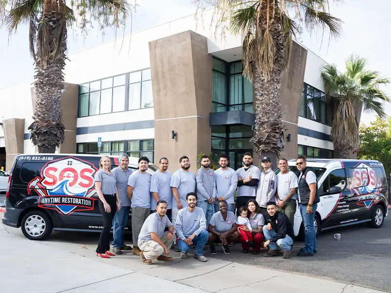 SOS ANYTIME RESTORATION expert technician performing water damage assessment and restoration in Spring Valley, CA